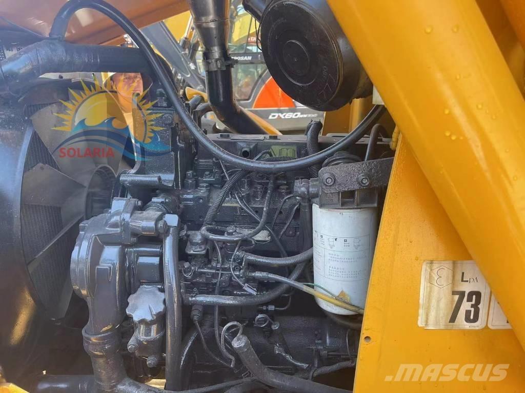 JCB Vibromax 4CX Товарач със заден ексватор