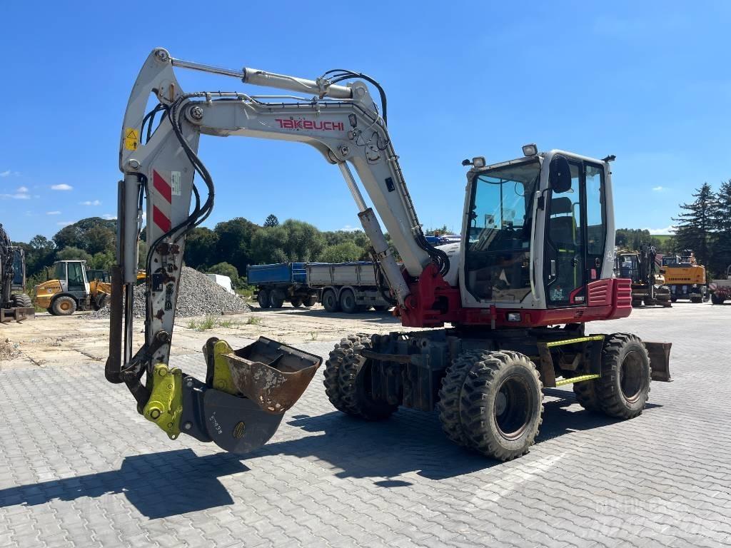 Takeuchi TB 295W Колесни екскаватори