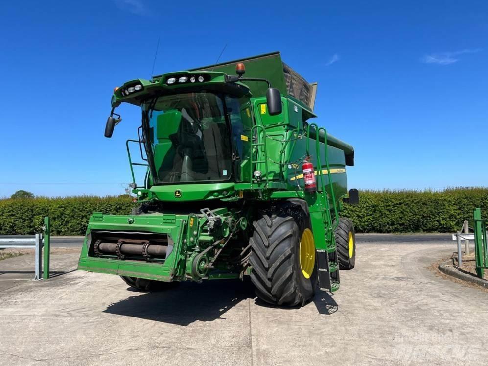 John Deere T670HM Комбайни