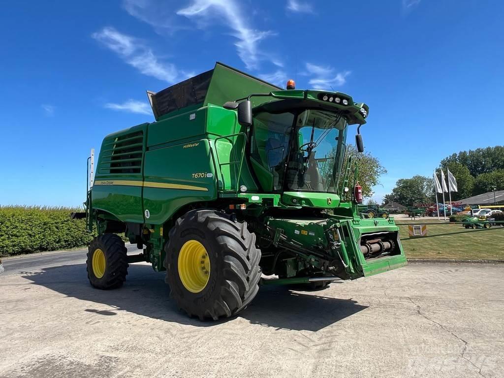 John Deere T670HM Комбайни