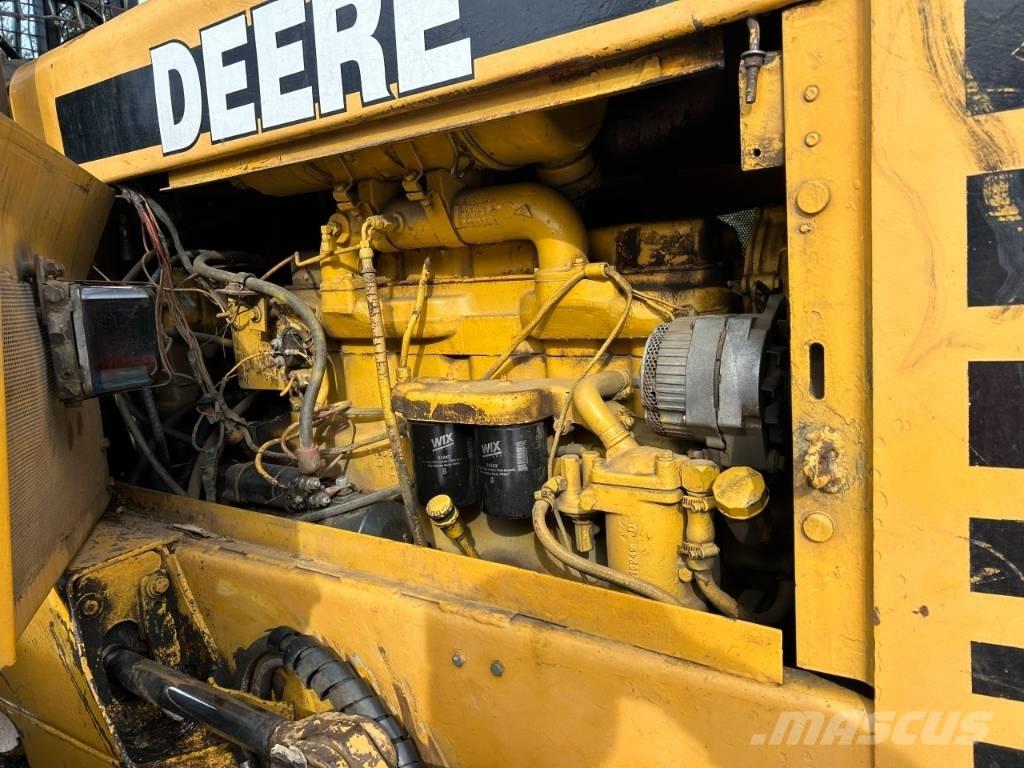 John Deere 640 D Скидери
