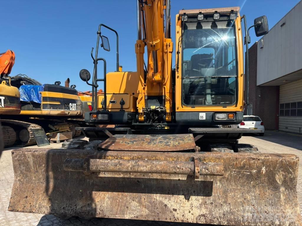 Hyundai 140W-9A Колесни екскаватори