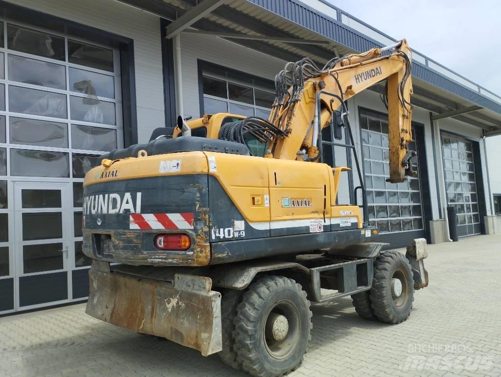 Hyundai 140W Средни екскаватори 7т - 12т
