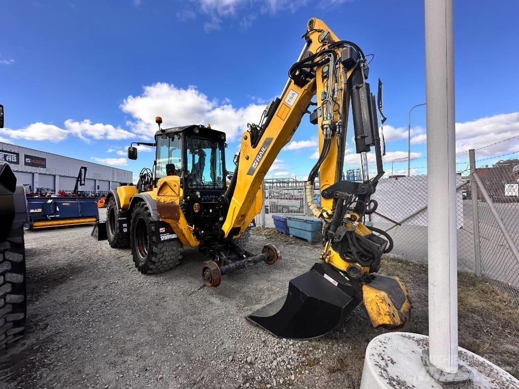 Huddig 1260 C Товарач със заден ексватор