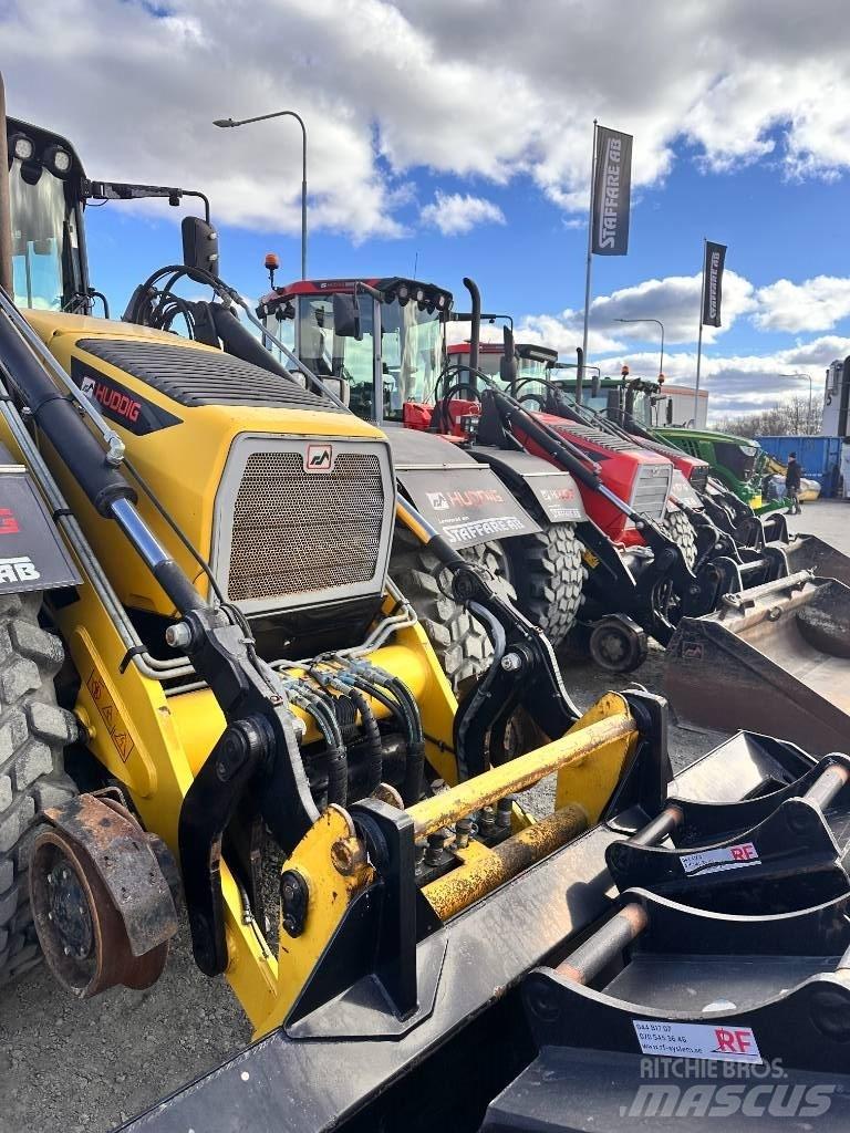 Huddig 1260 C Товарач със заден ексватор