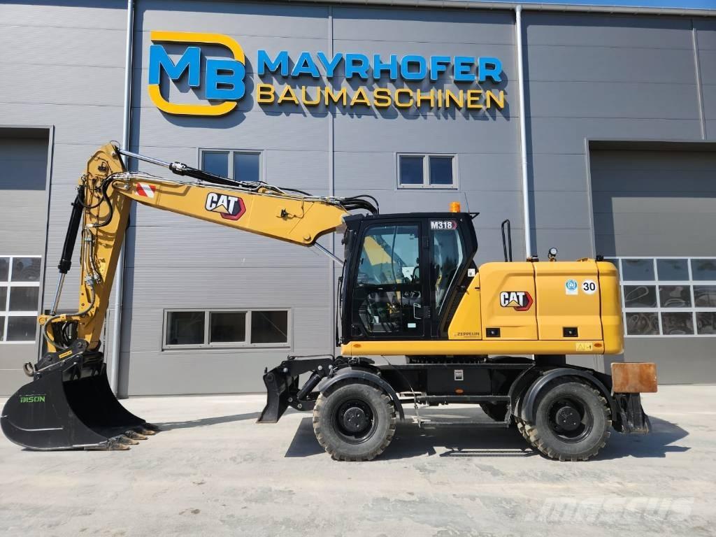 CAT M 318 Колесни екскаватори
