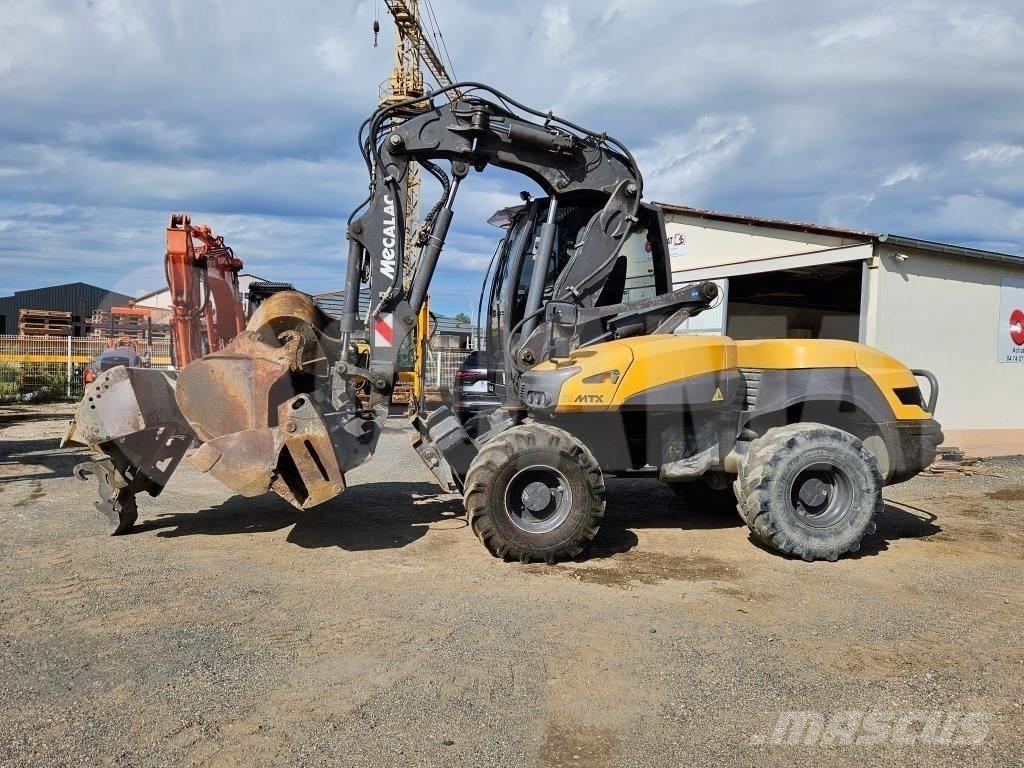 Mecalac 12 MTX Колесни екскаватори