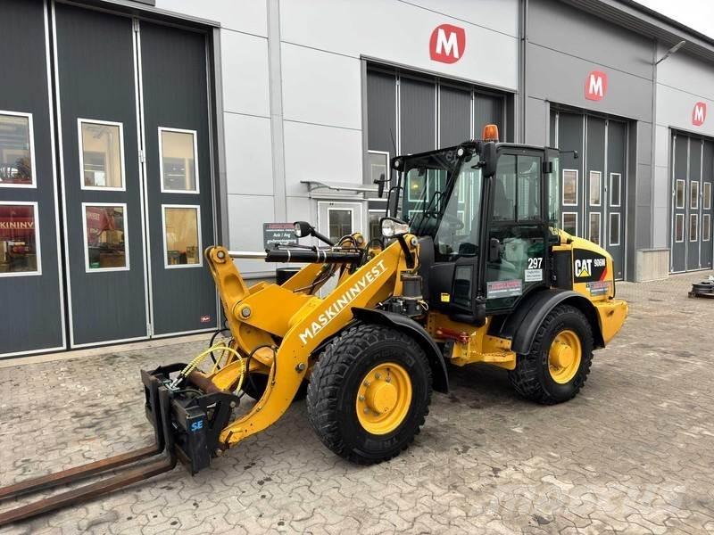 CAT 906M Cat 906M Колесни товарачи