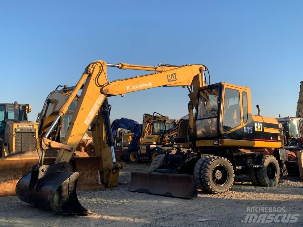 CAT M 315 Колесни екскаватори