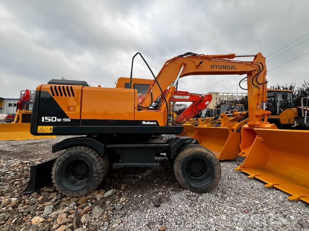 Hyundai 150W-7 Колесни екскаватори