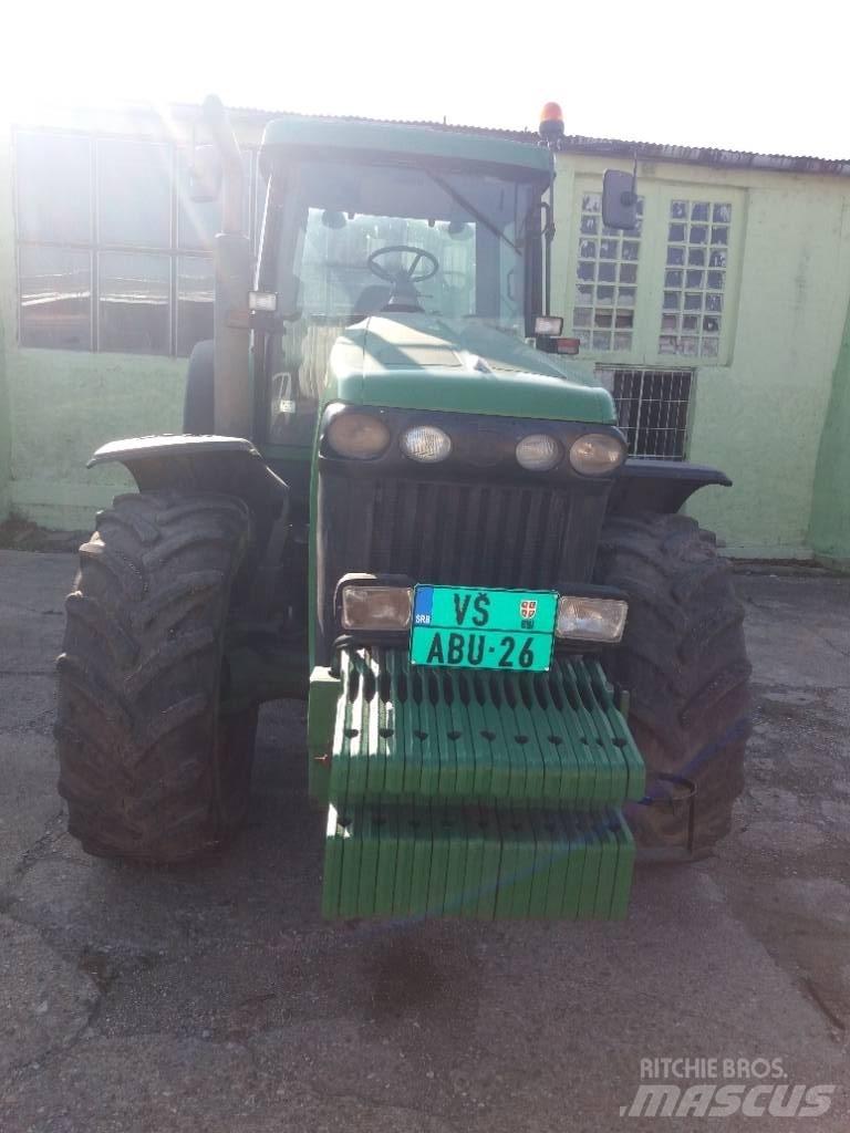 John Deere 8320 Трактори