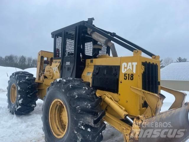 CAT 518 C Скидери
