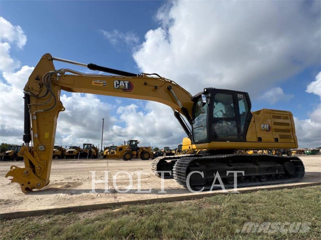 CAT 323 TC Колесни товарачи