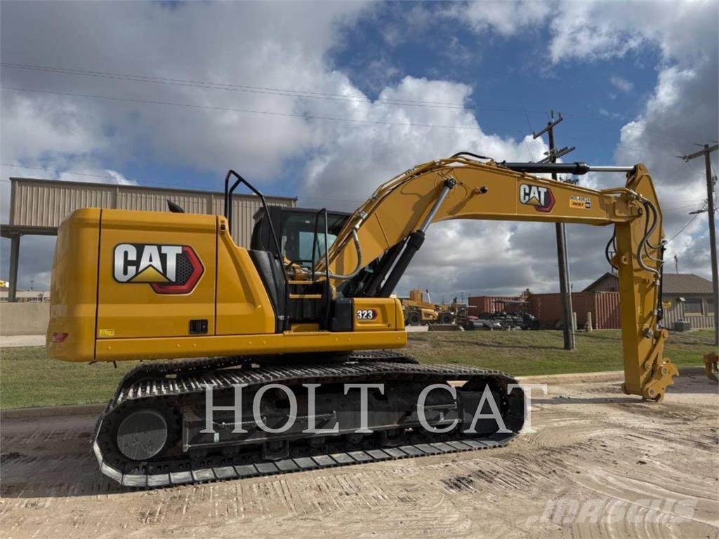 CAT 323 TC Колесни товарачи