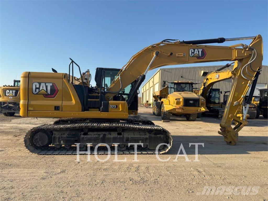 CAT 323 TC Колесни товарачи