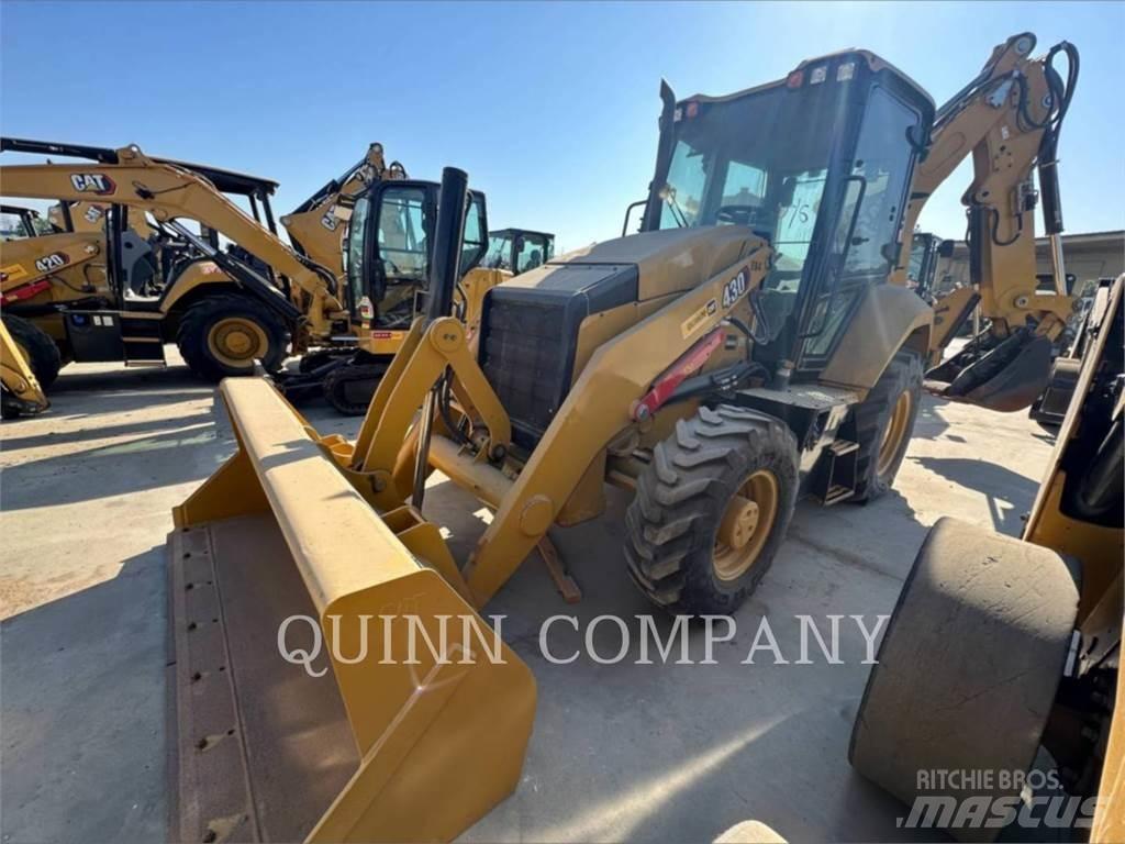 CAT 430 Товарач със заден ексватор