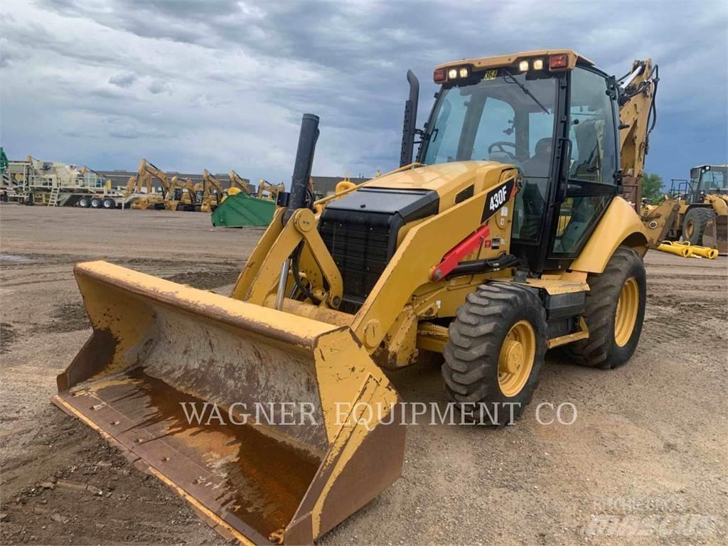 CAT 430F 4WD Товарач със заден ексватор