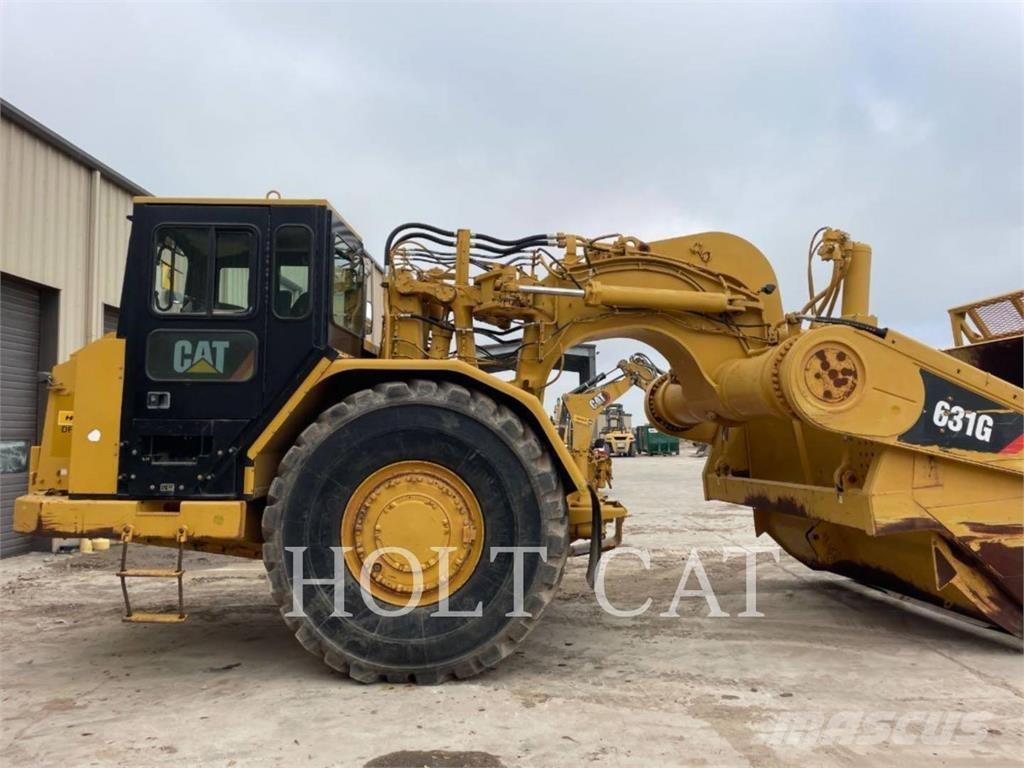 CAT 631G Скрепери
