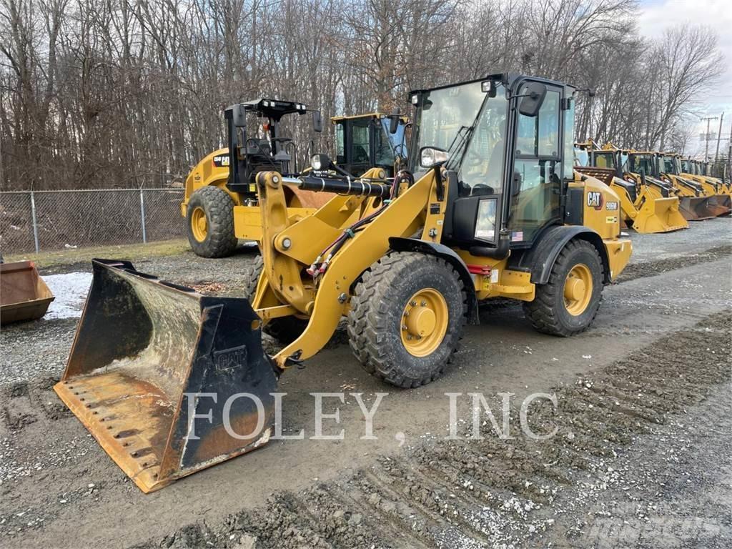 CAT 906M Колесни товарачи
