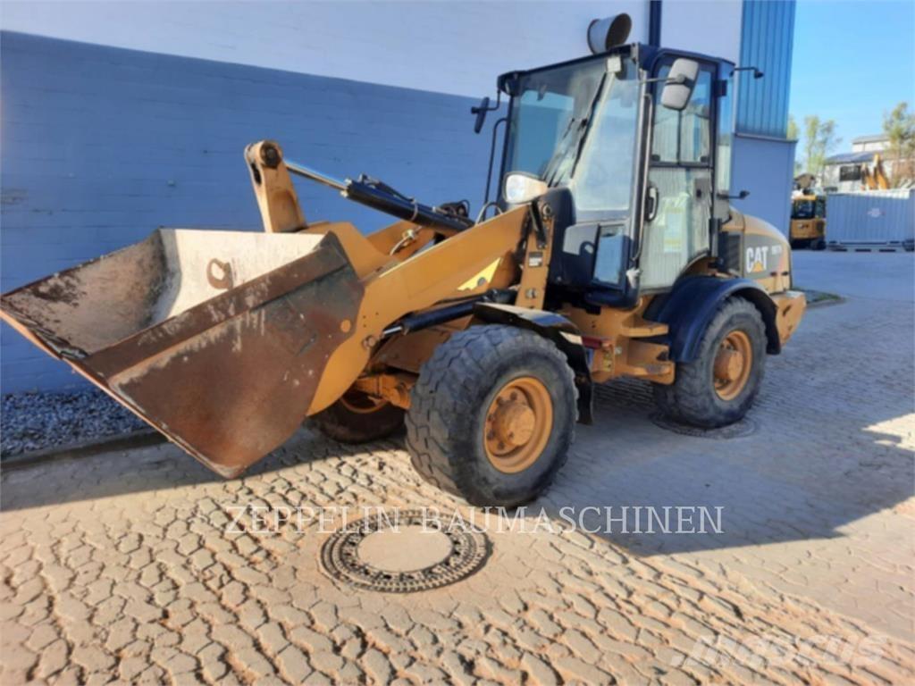 CAT 907H Колесни товарачи