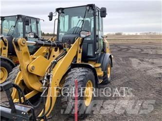 CAT 907M Колесни товарачи