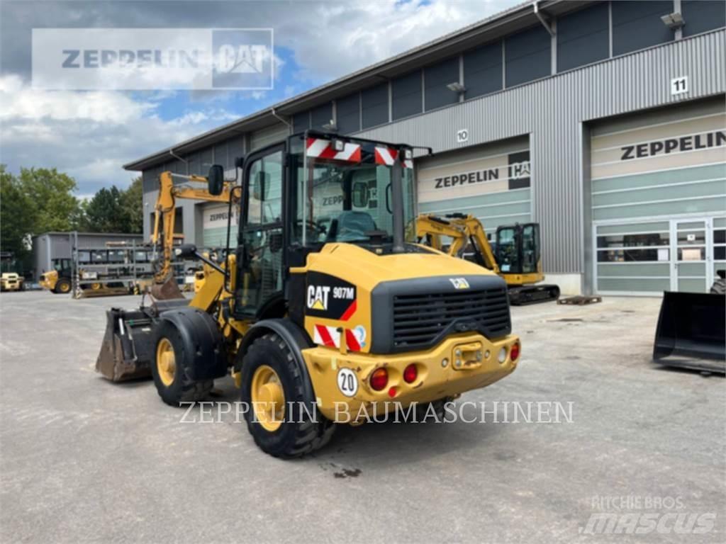 CAT 907M Колесни товарачи