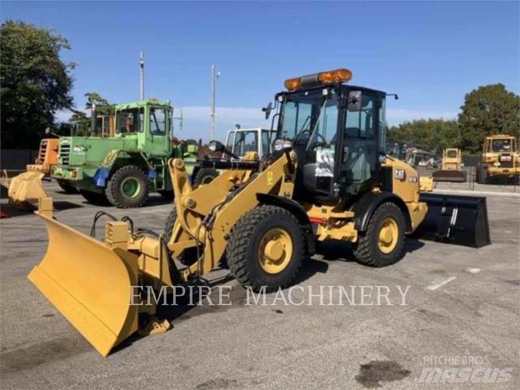 CAT 907M Колесни товарачи