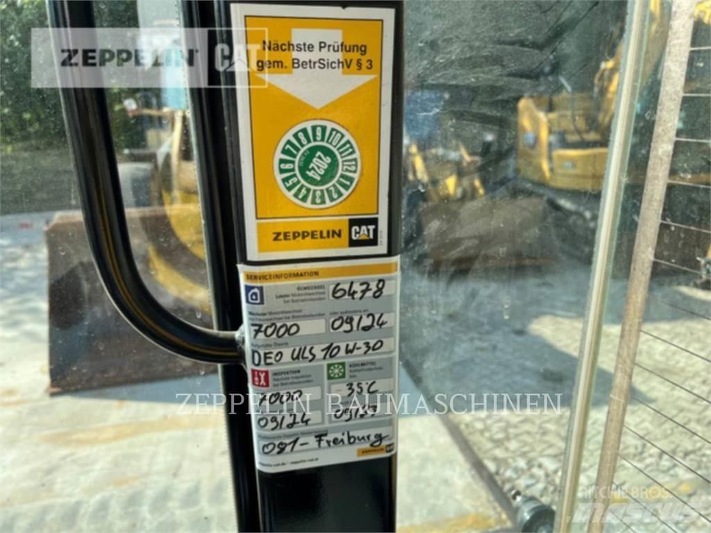 CAT 907M Колесни товарачи