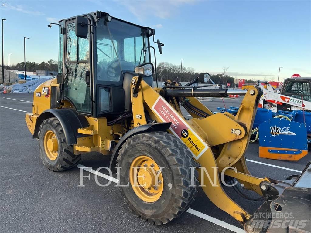 CAT 907M Колесни товарачи
