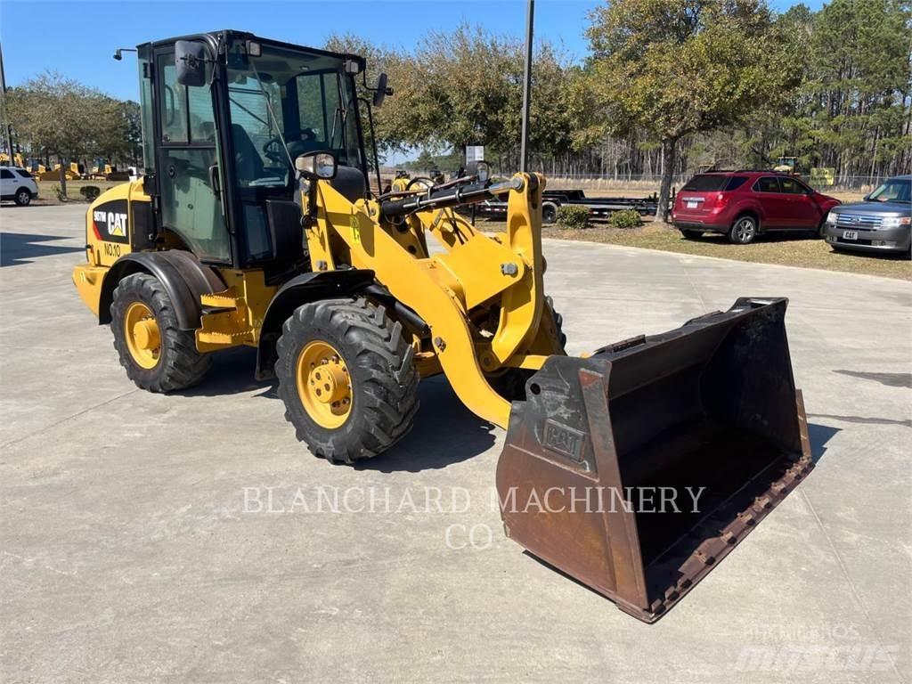 CAT 907M Колесни товарачи