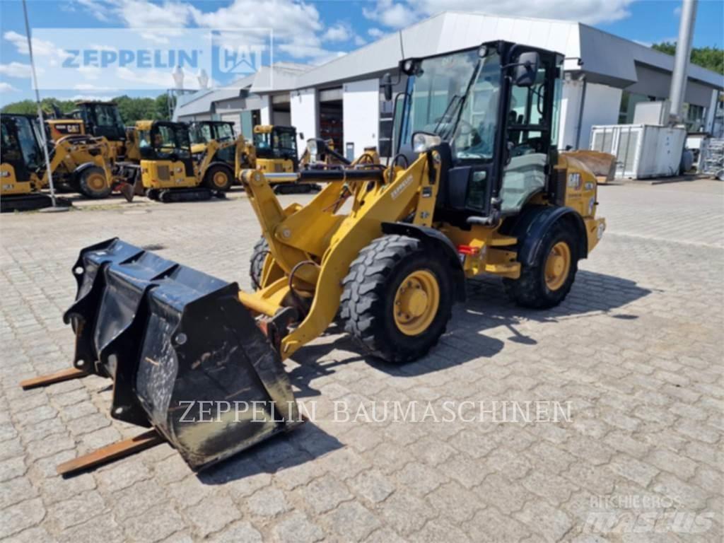 CAT 907M Колесни товарачи