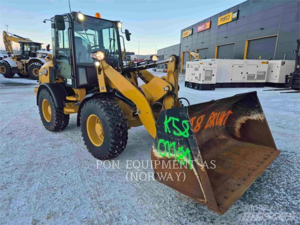 CAT 908M Колесни товарачи