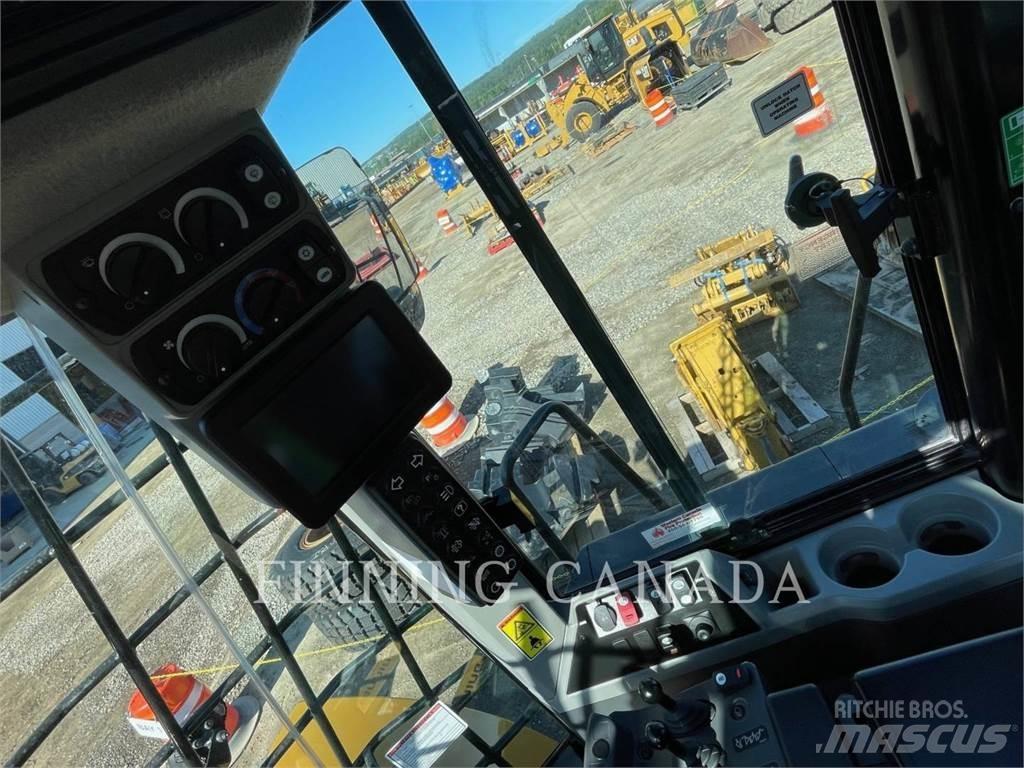 CAT 966M Колесни товарачи