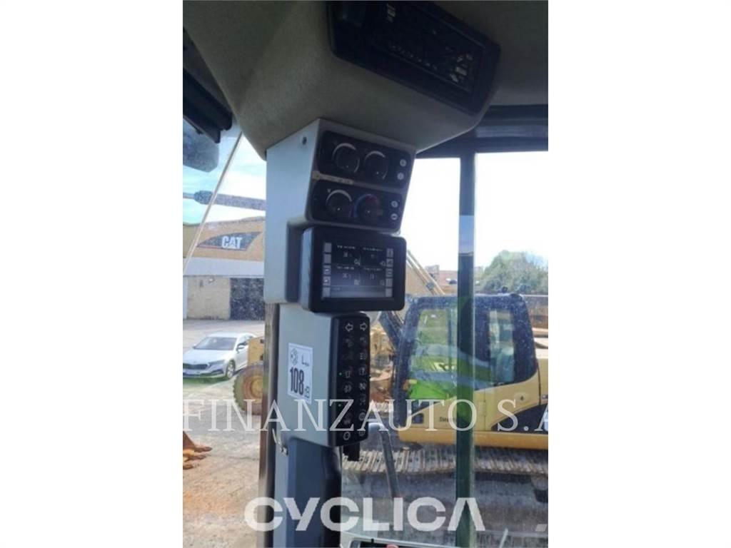 CAT 966M Колесни товарачи