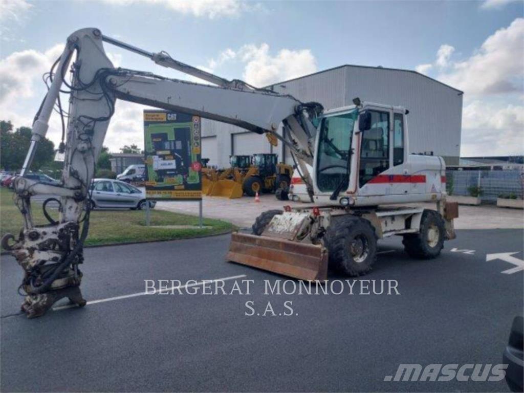 CAT M313D Колесни екскаватори