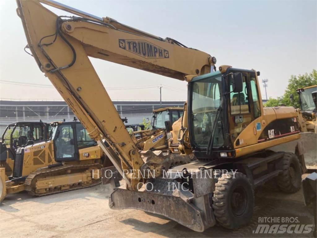 CAT M322C Колесни екскаватори