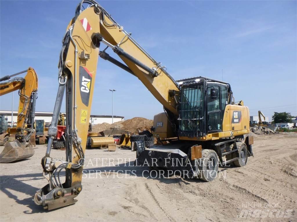 CAT MH3022-06 Колесни екскаватори