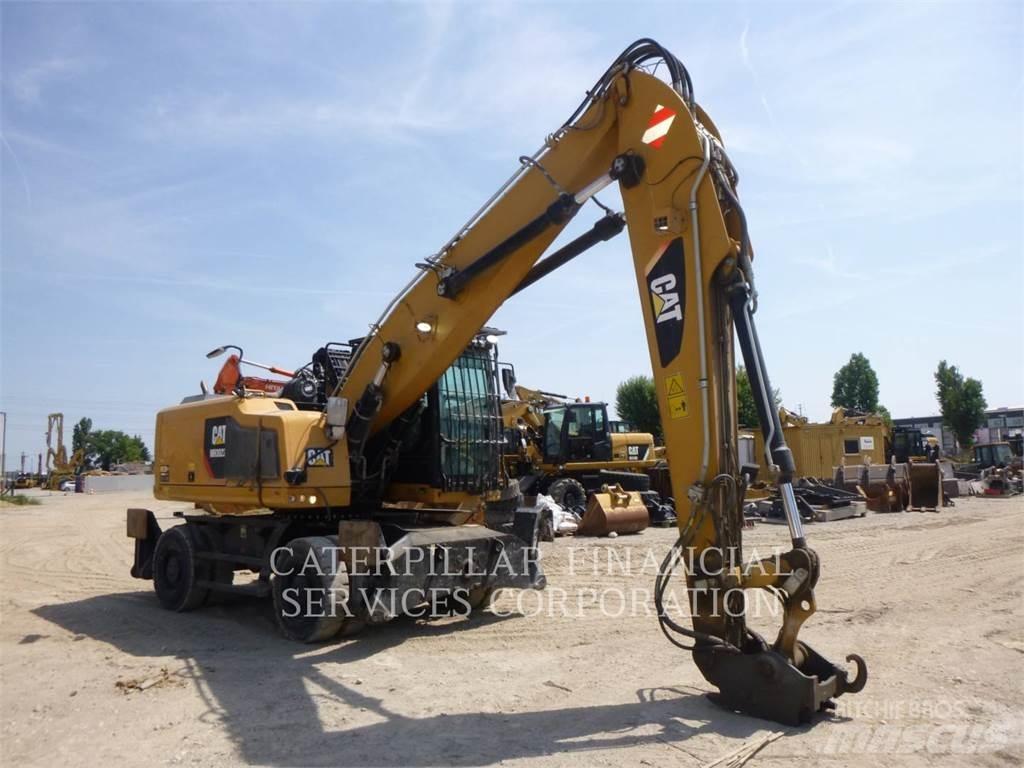 CAT MH3022-06 Колесни екскаватори