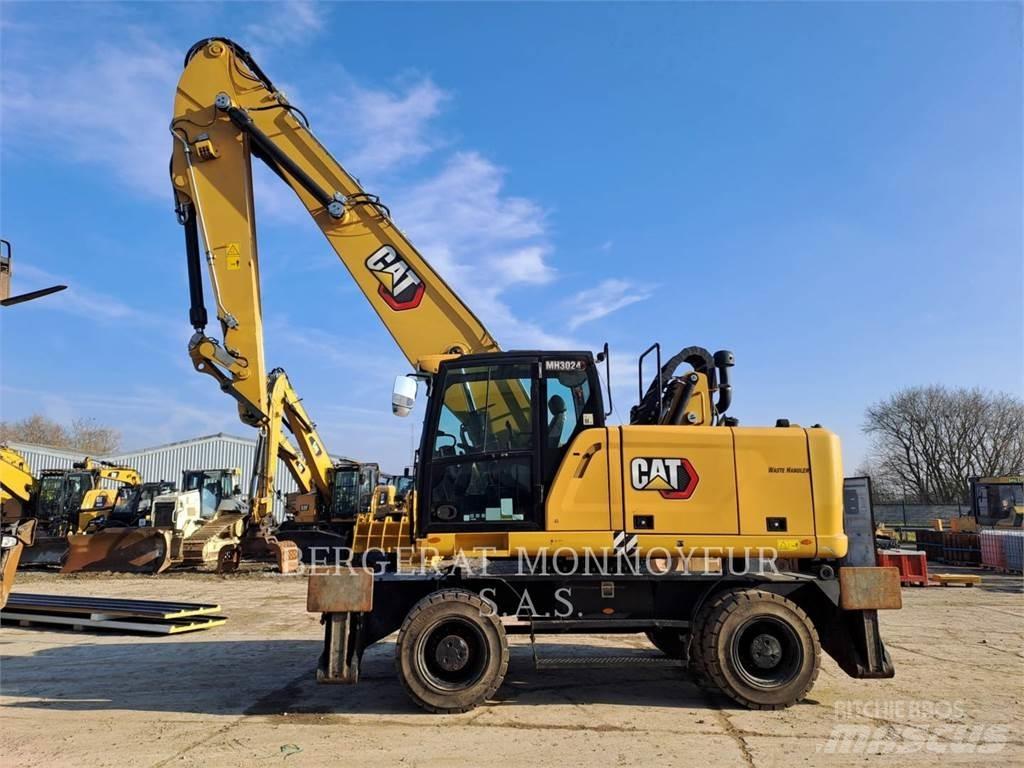 CAT MH3024 Колесни екскаватори