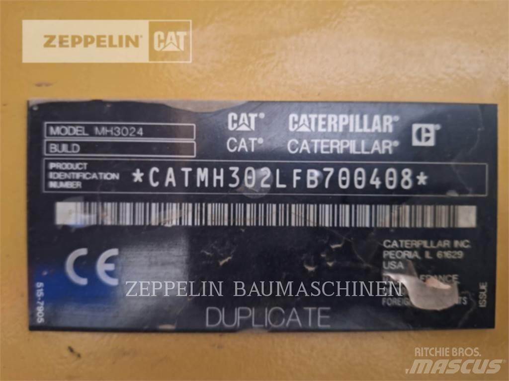 CAT MH3024-06C Багери за разрушаване

