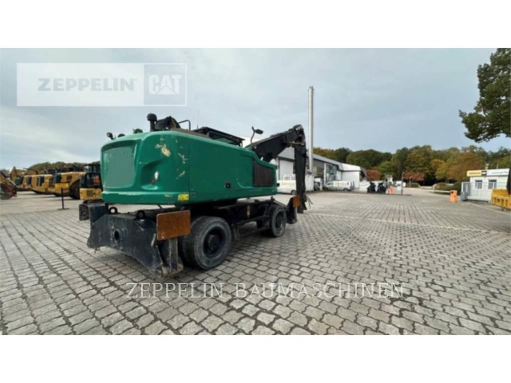 CAT MH3024-06C Багери за разрушаване
