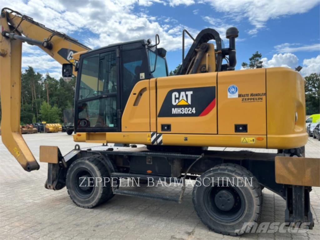 CAT MH3024-06C Багери за разрушаване
