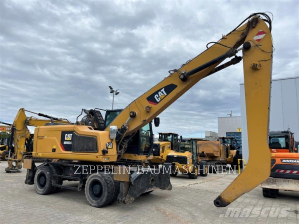 CAT MH3024-06C Багери за разрушаване
