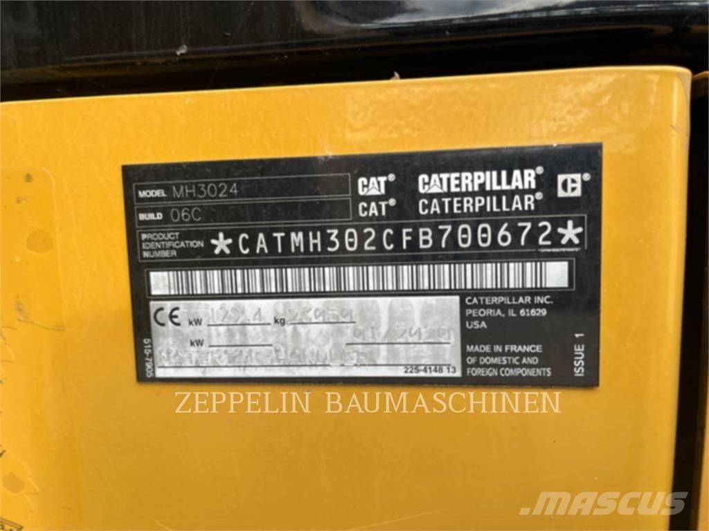CAT MH3024-06C Багери за разрушаване
