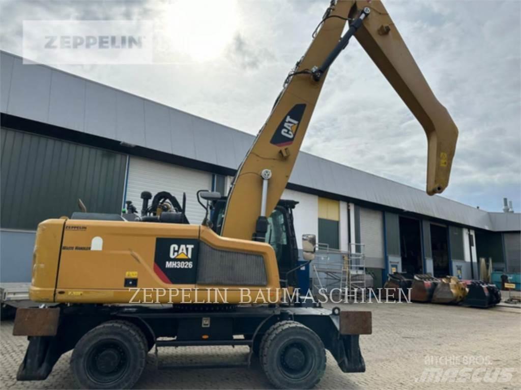 CAT MH3026-06C Багери за разрушаване
