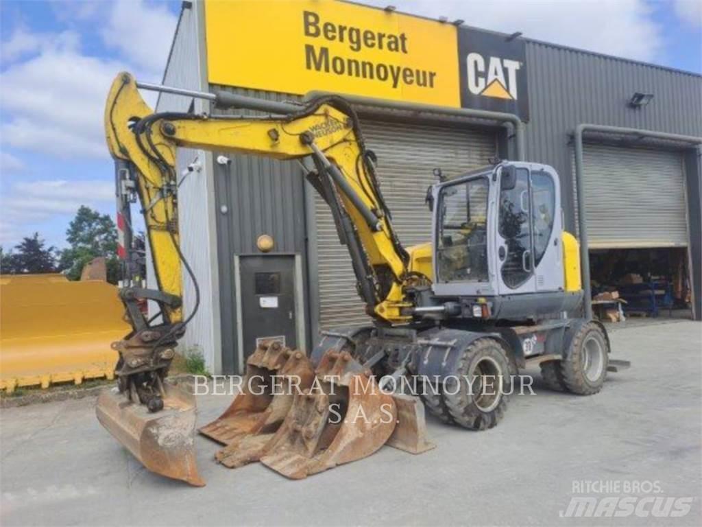 Neuson EW100 Колесни екскаватори
