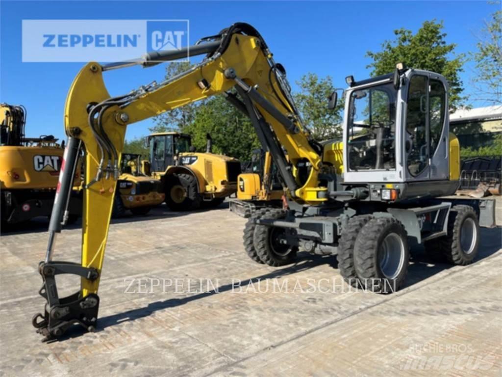 Neuson EW100 Колесни екскаватори