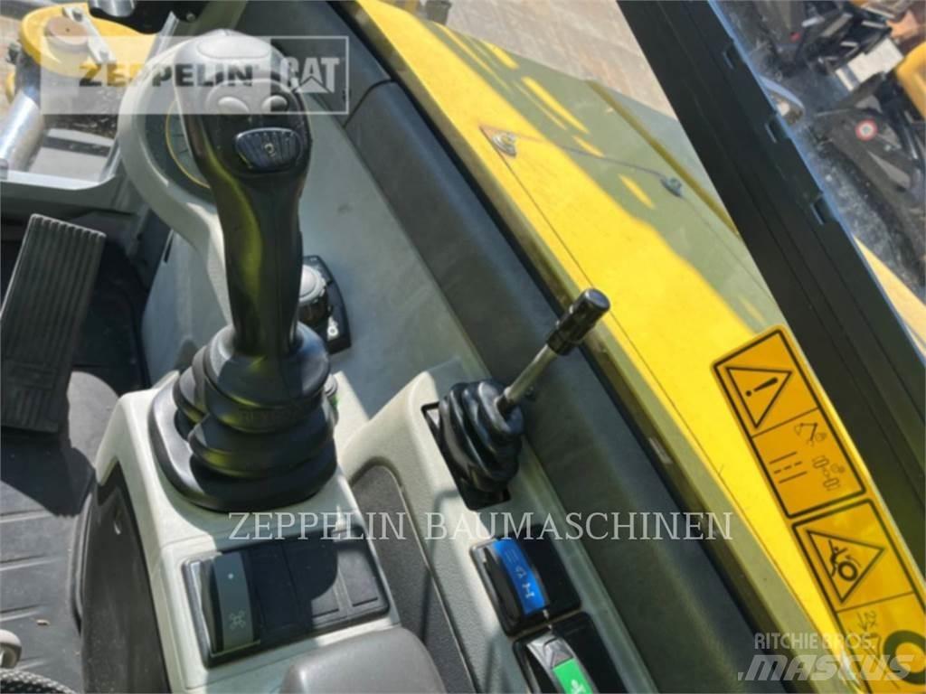 Neuson EW100 Колесни екскаватори