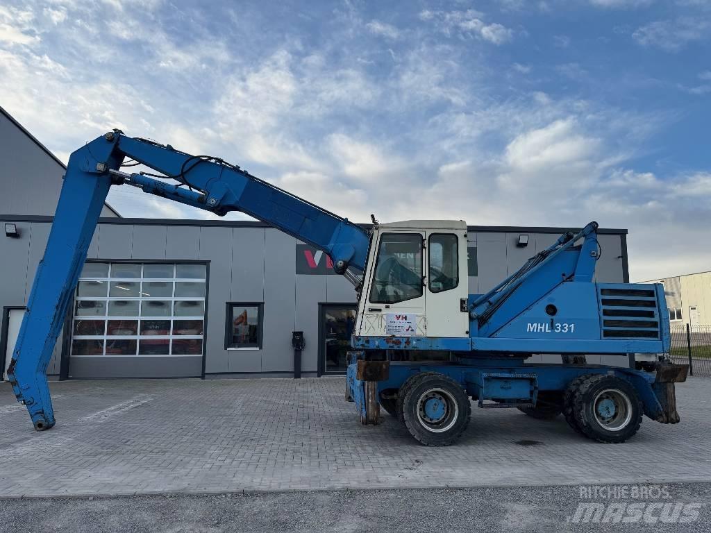 Fuchs MHL 331 Оператори на отпадъци/индустрия
