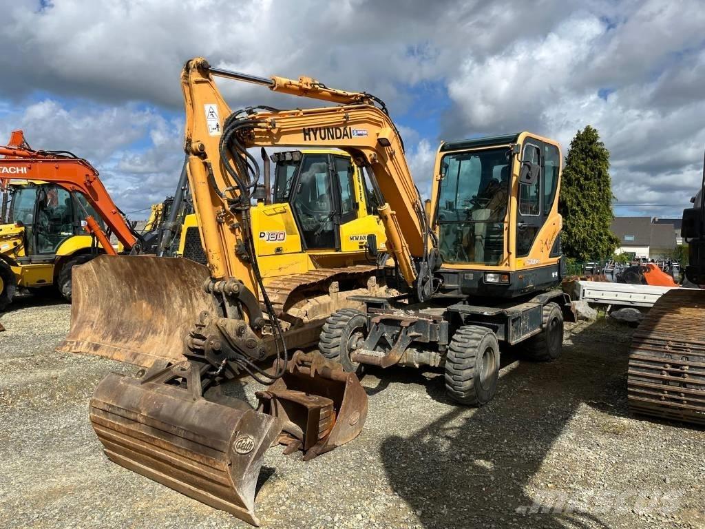 Hyundai R55W-9 Колесни екскаватори